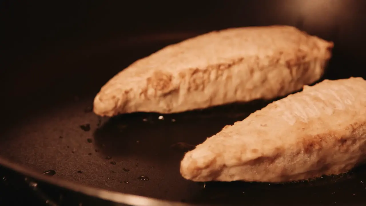 Vegan PlantBased Chicken Fillet Cooking in Hot Frying Pan