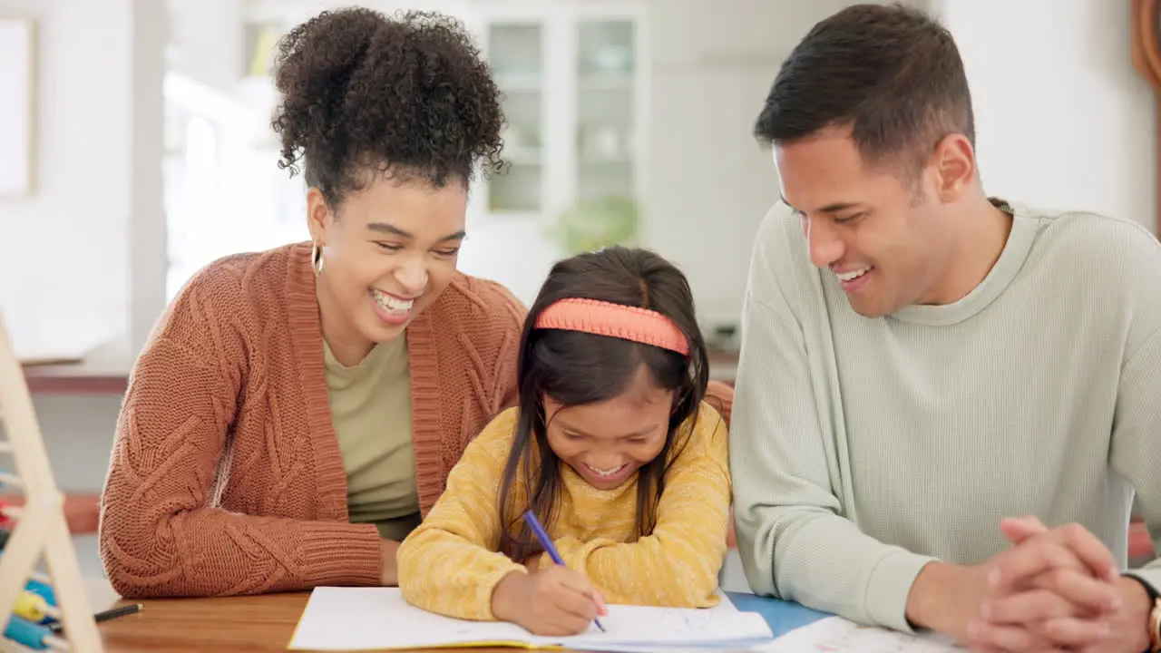 Happy family learning and parents with girl