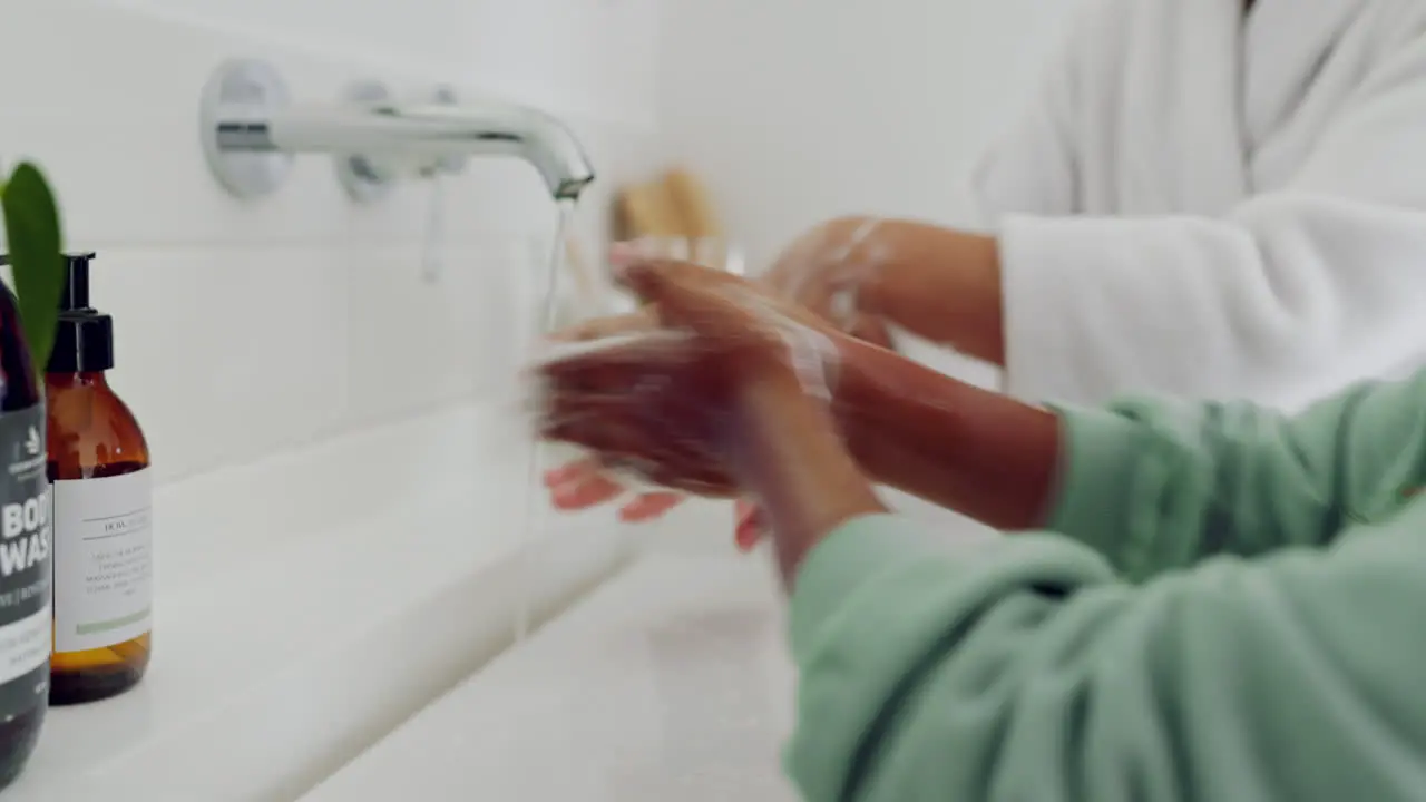 Closeup mom or kid cleaning hands for hygiene