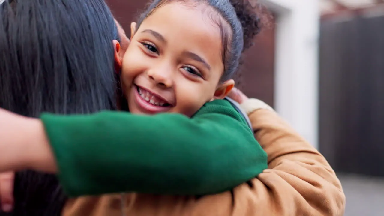 Mom girl and hug with smile for school