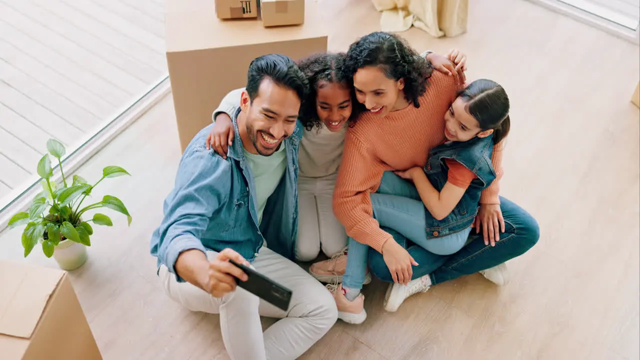 Happy family real estate and laughing in new home