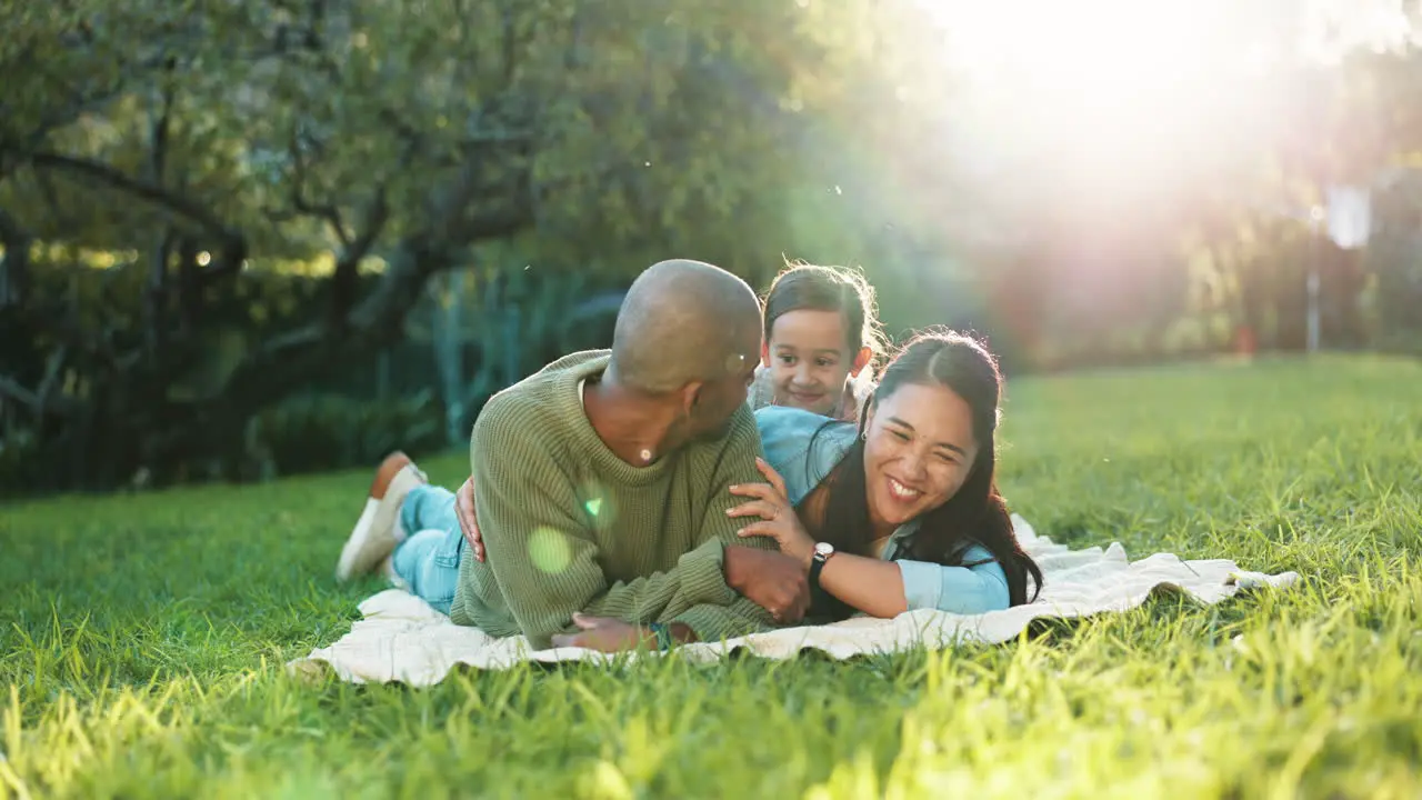 Happy family grass and parents on a picnic