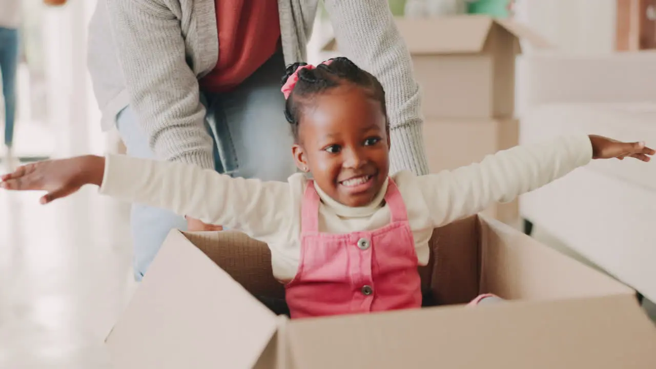 Kid mother and push box in new house for playing