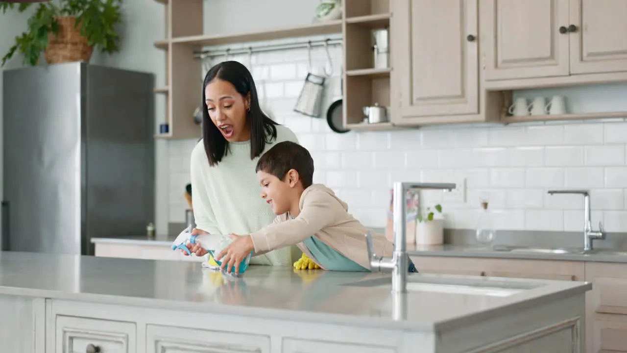 Teaching kid mom and cleaning the kitchen