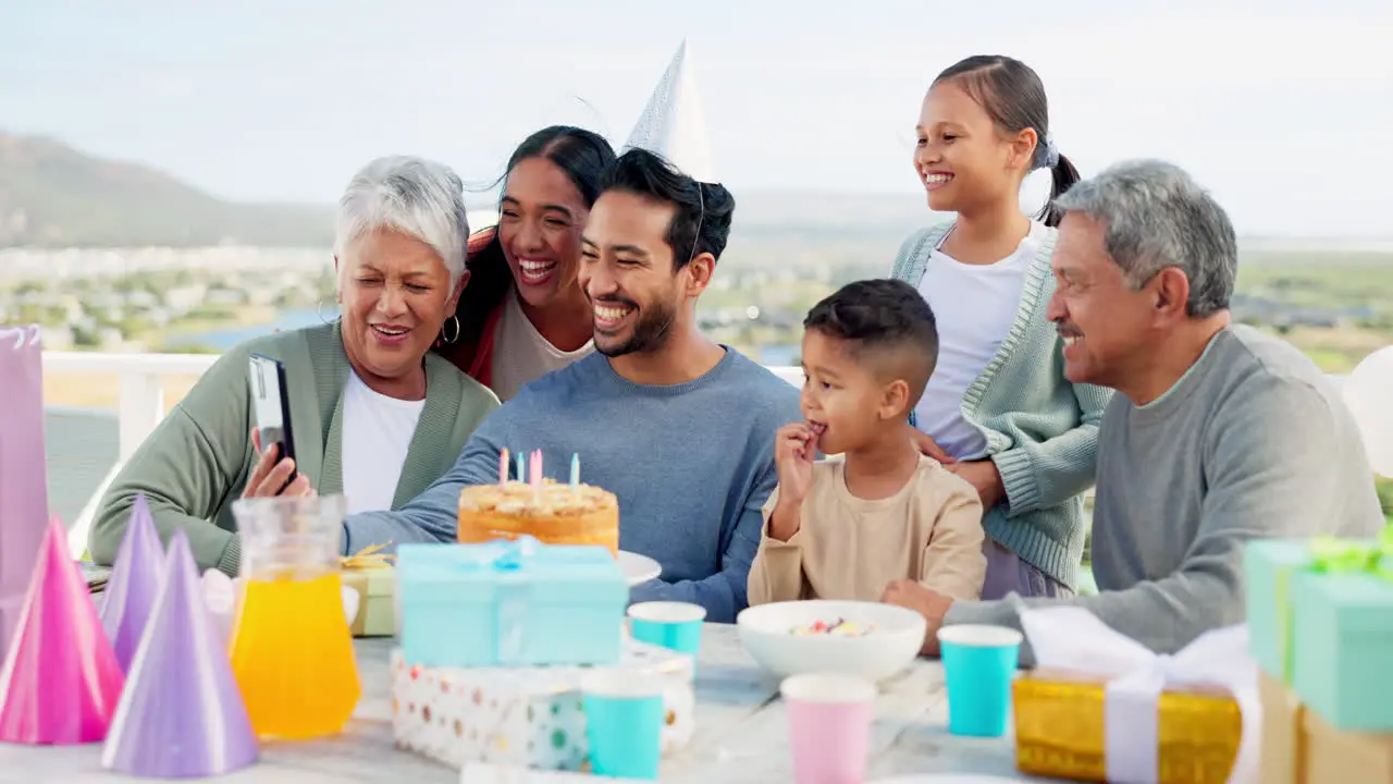 Phone video call and big family at a party