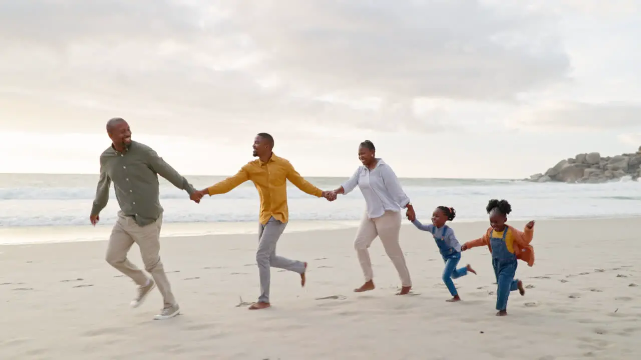 Happy black family and holding hands