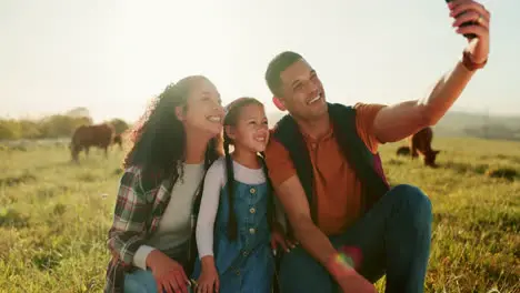 Happy family selfie and phone on a farm with cows