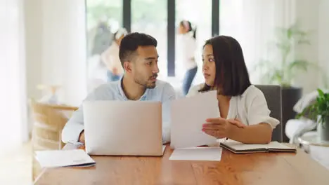 Worried stressed married couple discussing online