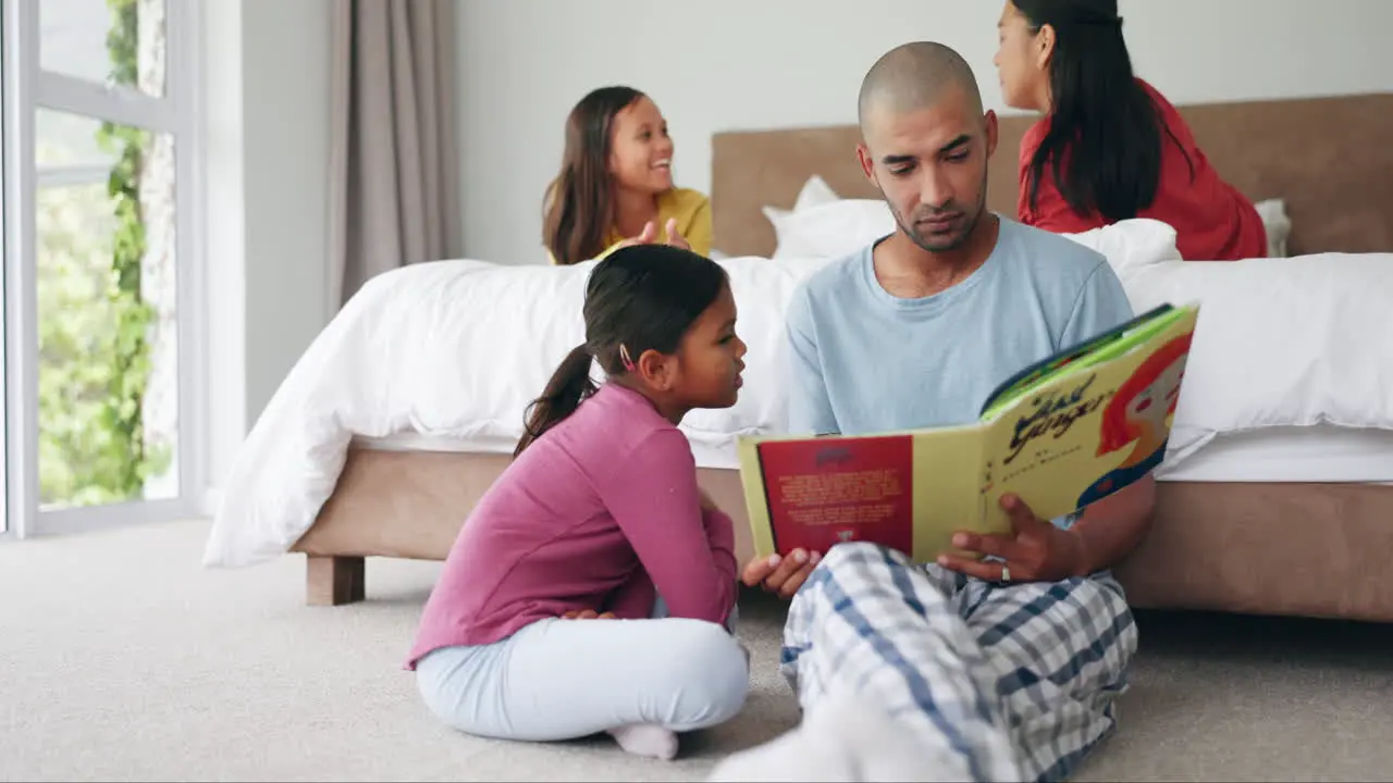 Dad girl and reading books in bedroom