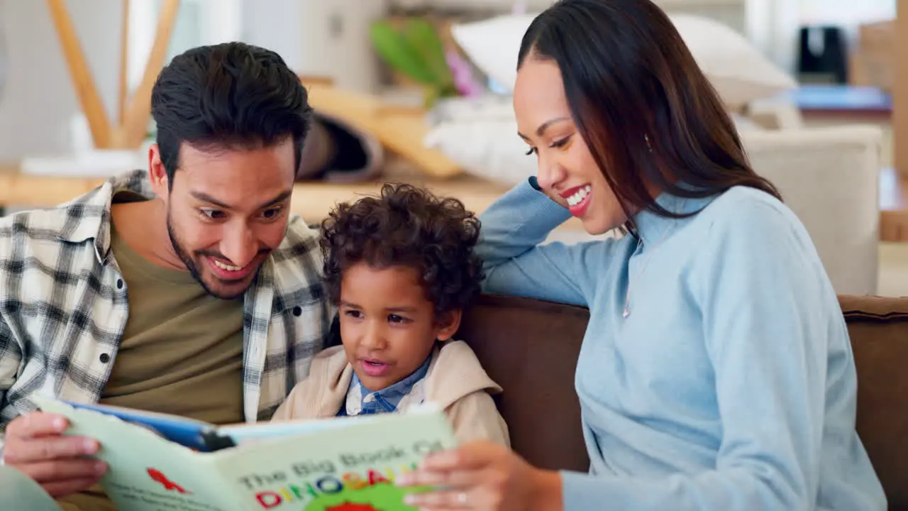 Father mother and happy child reading books