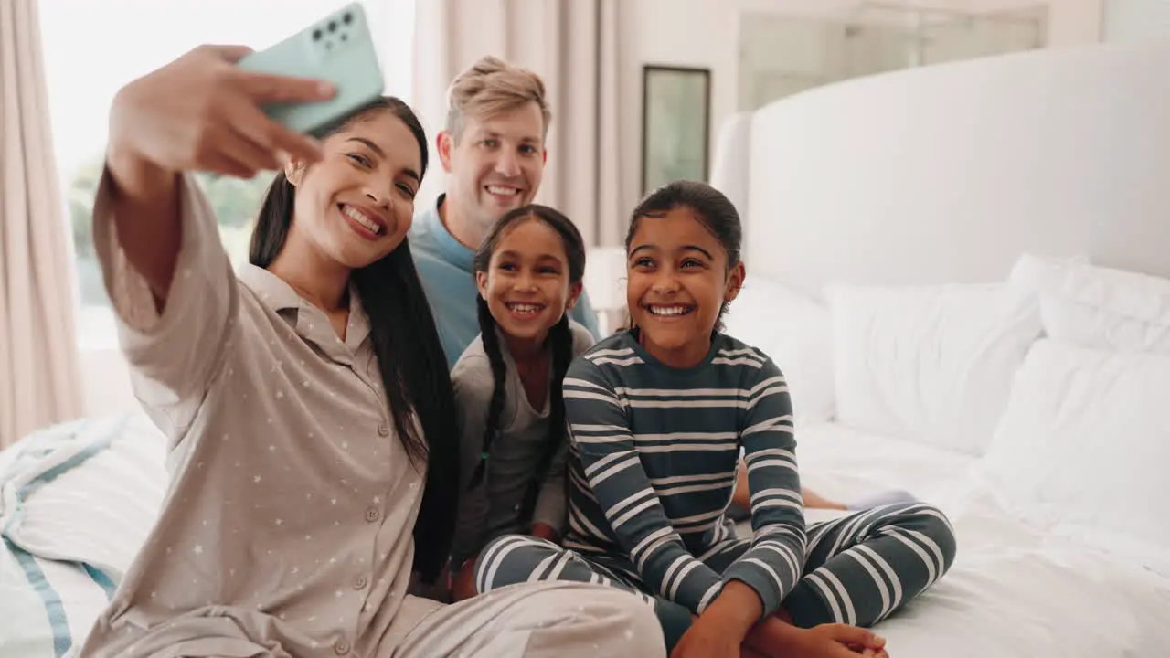 Selfie funny and happy family in home bedroom