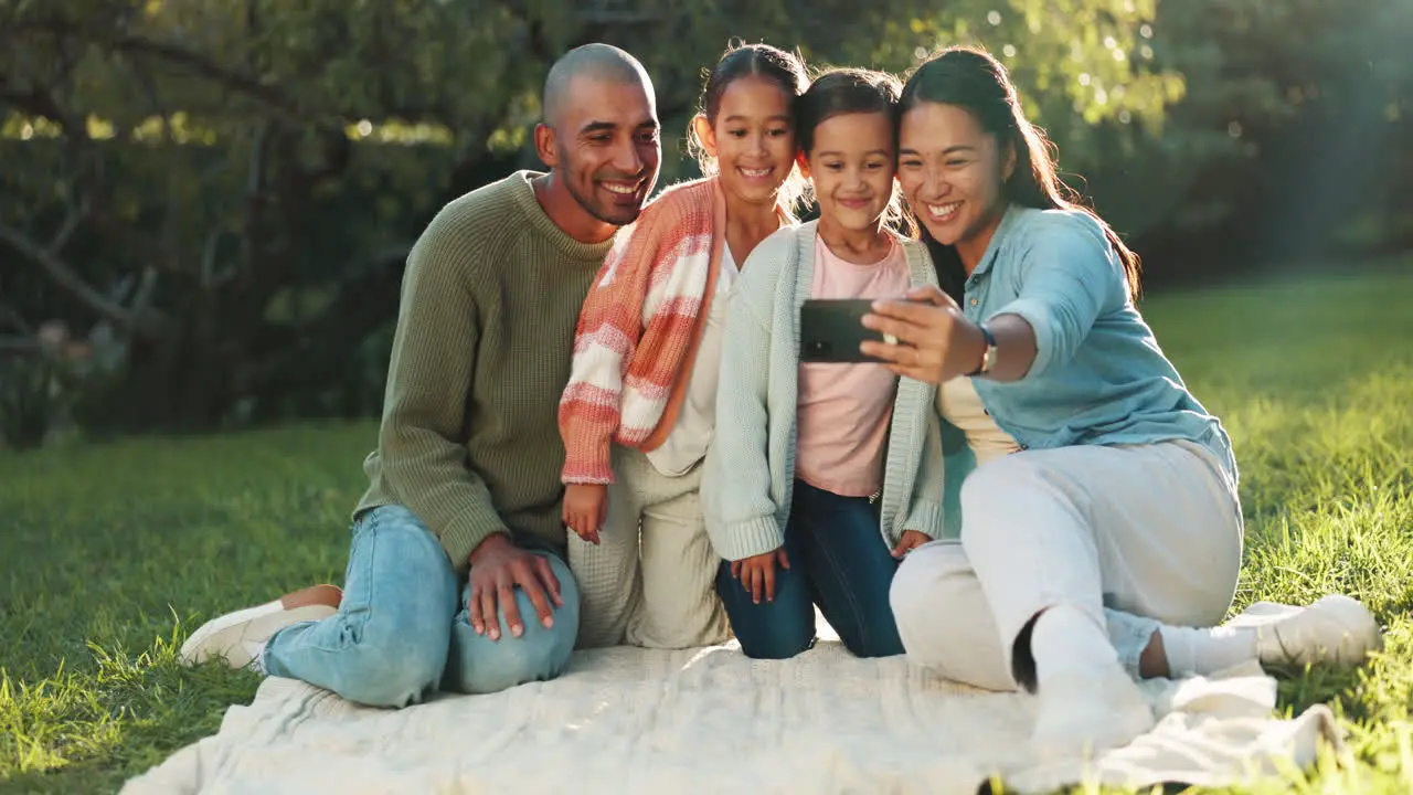 Selfie happy family and picnic blanket in nature