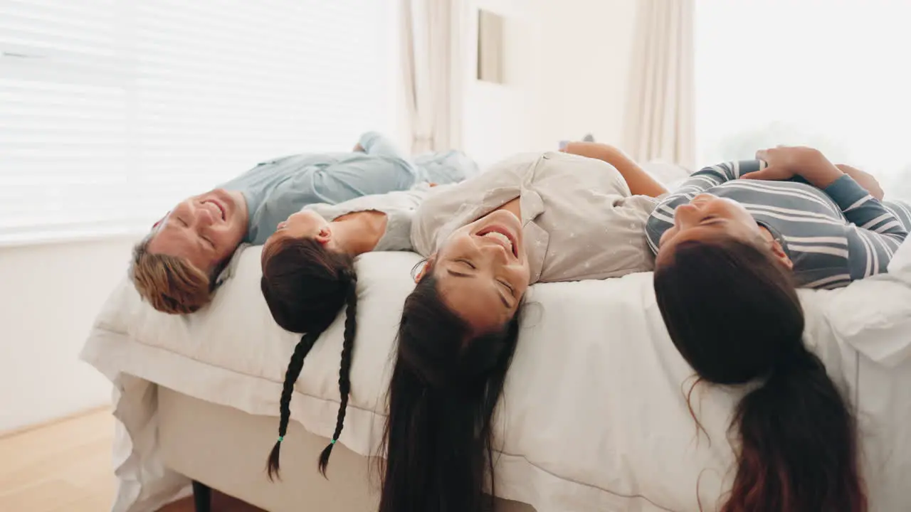 Happy family bed and children playing