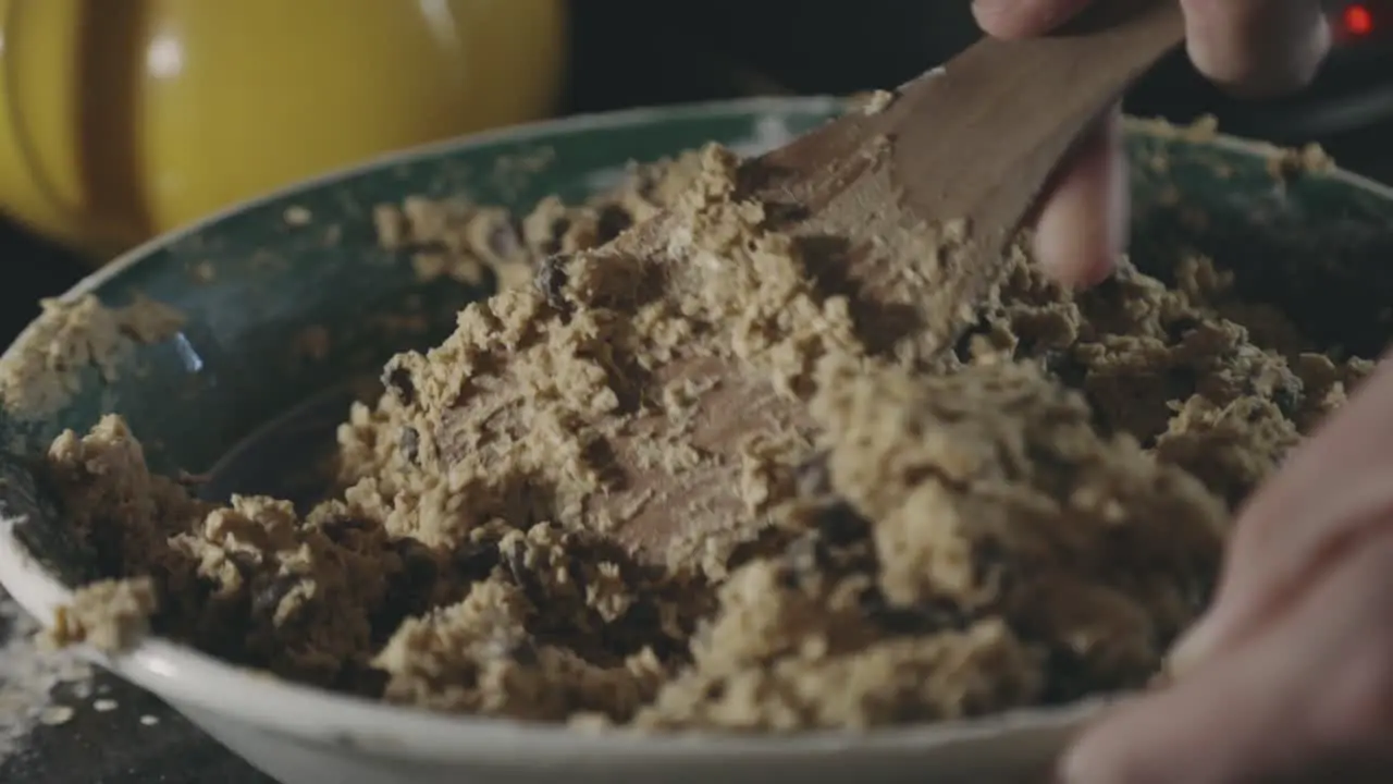 Mixing Cookie Mixture With Chocolate Chips In A Bowl close up