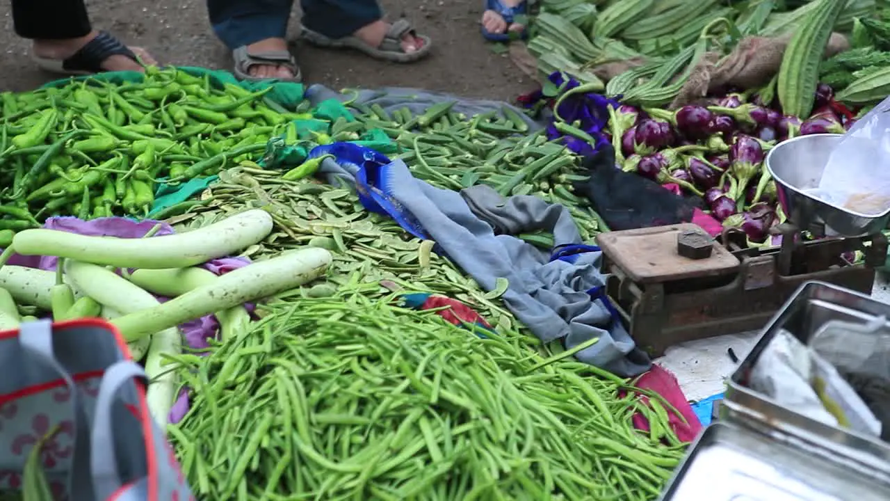 local vegetables market old woman venders sell their vegetables into local market close up shoot of vegetables