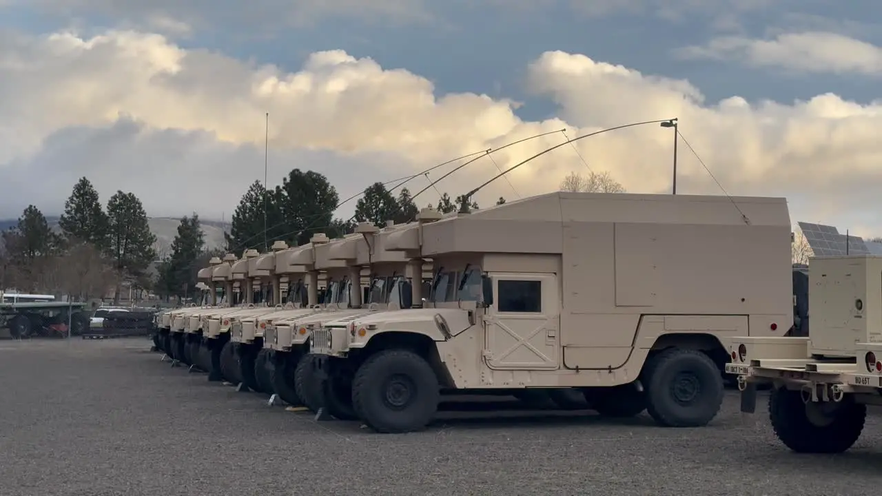 Clouds passing over supply military vehicles