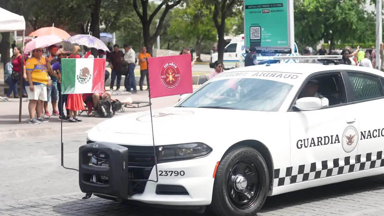 Guardia Nacional Mexican police car with armed police guard