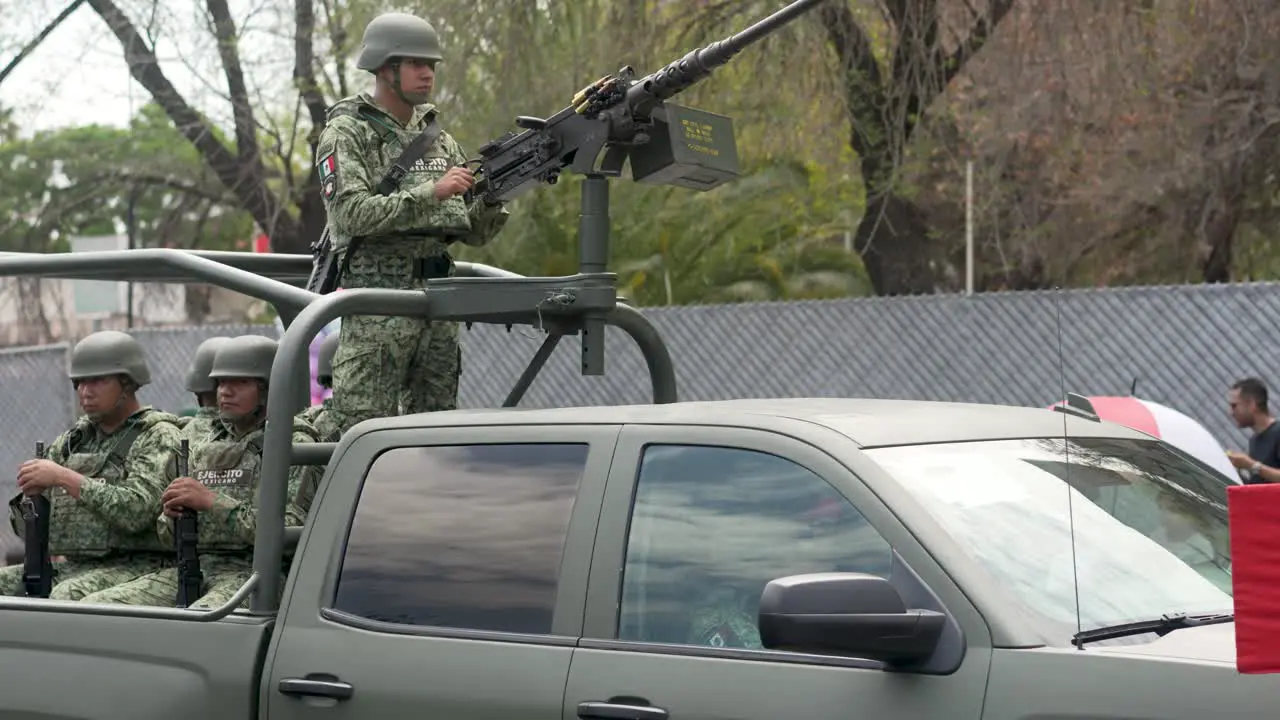 Pickup truck with heavy armed soldier on the top