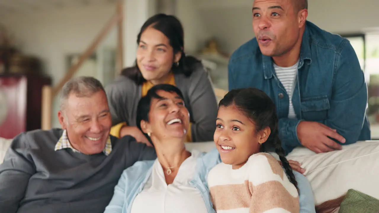 Big family relax and hug together on couch