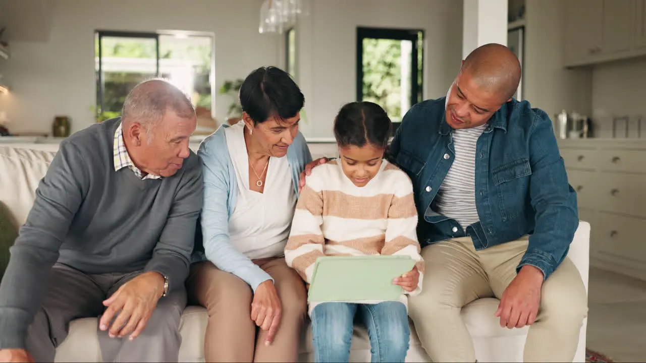 Big family tablet and child in home living room