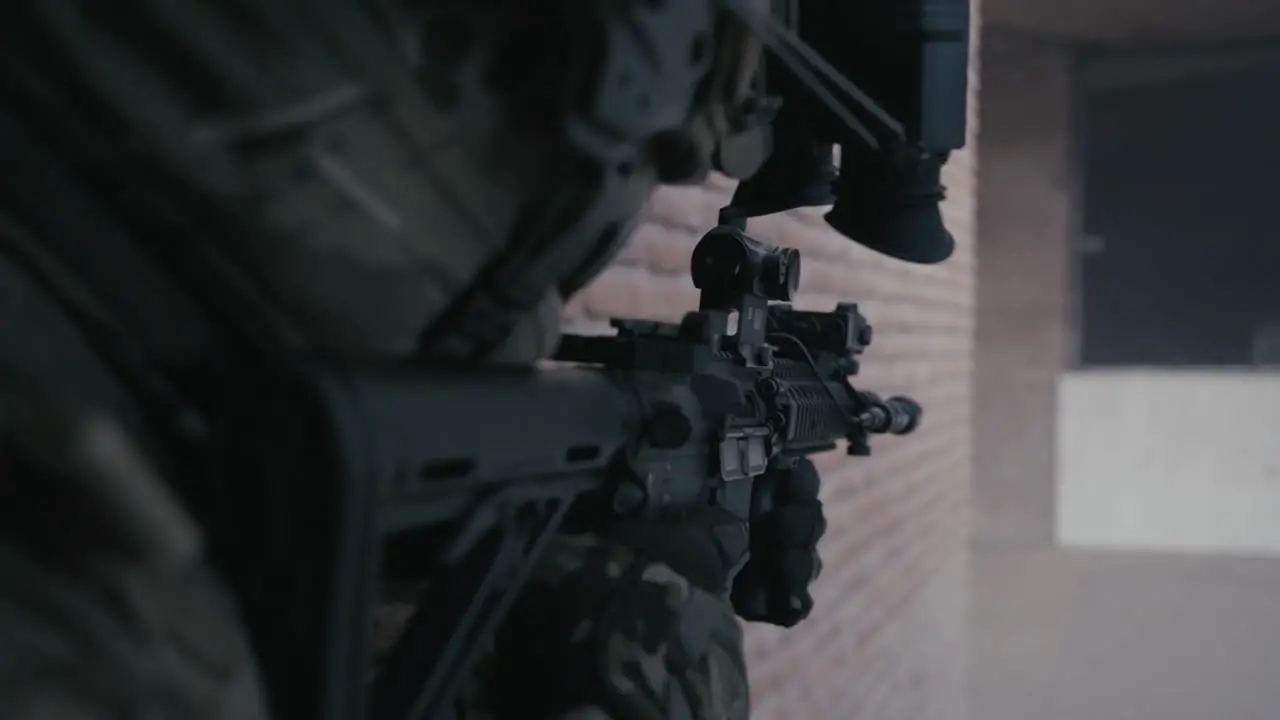 POV of armed IDF soldier holding rifle weapon in Gaza war sneaking