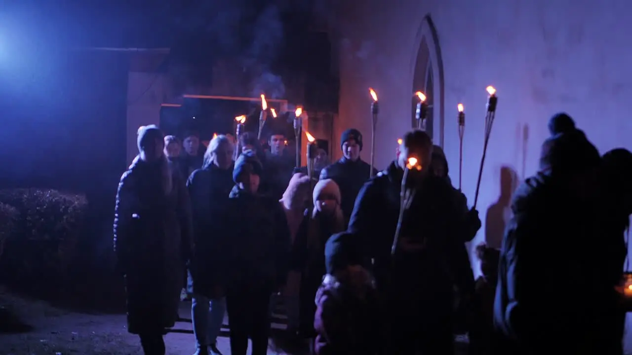 People with torches march through the city Memorial Day of the Fallen Soldiers