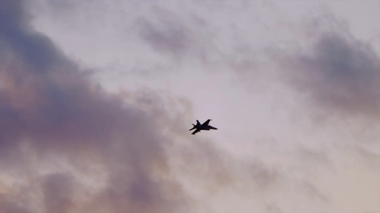 Single FA-18 Hornet hornet flys during sunset top gun