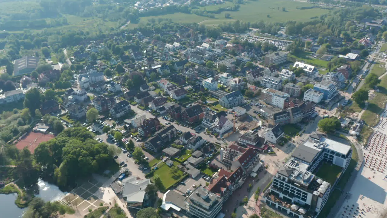 Aerial drone flying above city of Scharbeutz in Germany circle pan day