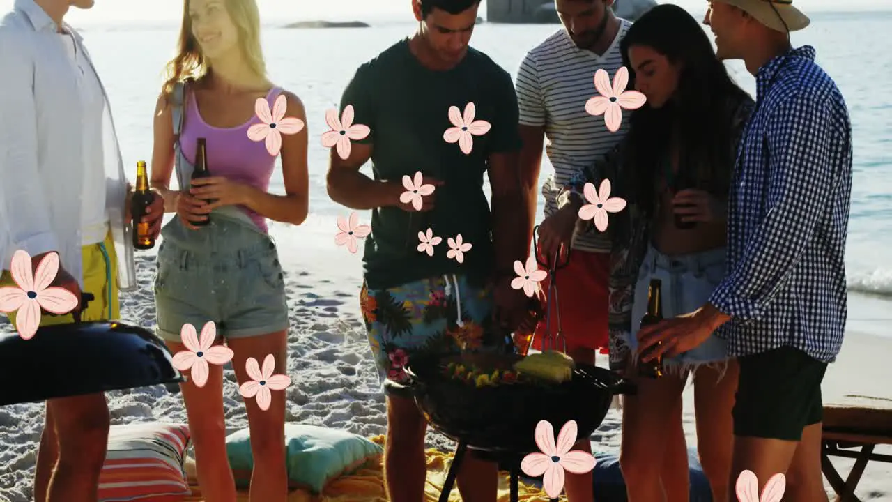 Animation of flowers over happy diverse friends having party on beach