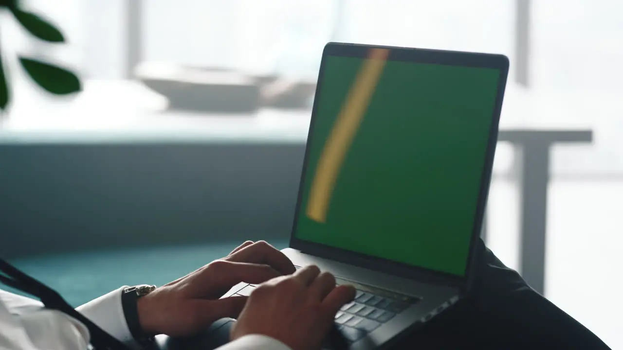 Businessman hands typing on laptop Professional working on computer