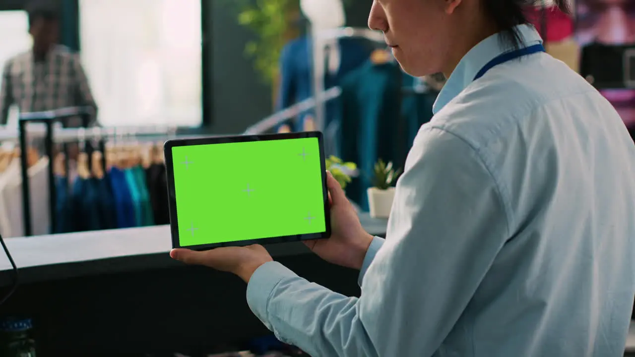 Store manager analyzing tablet computer