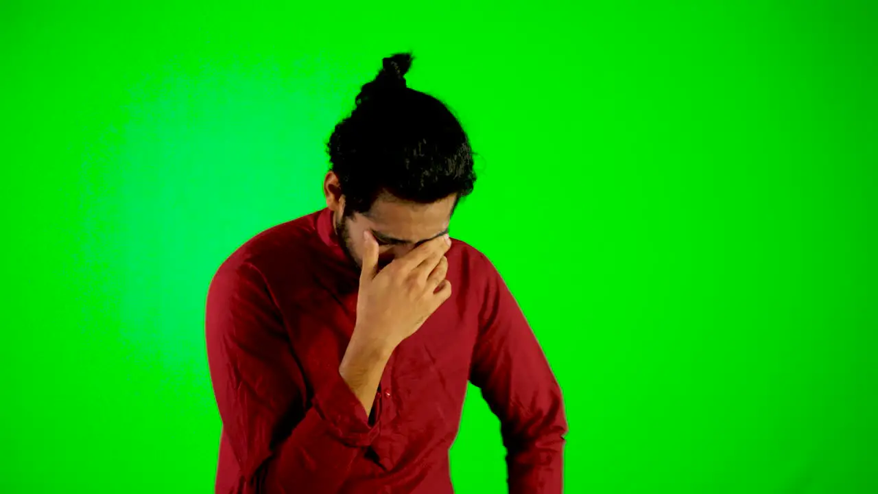 Indian guy emotionally frustrated with green screen green background guy with green background