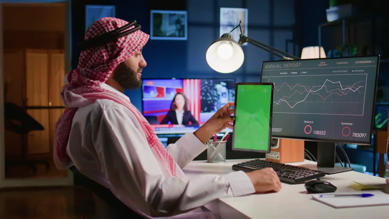 Remote employee holds chroma key tablet