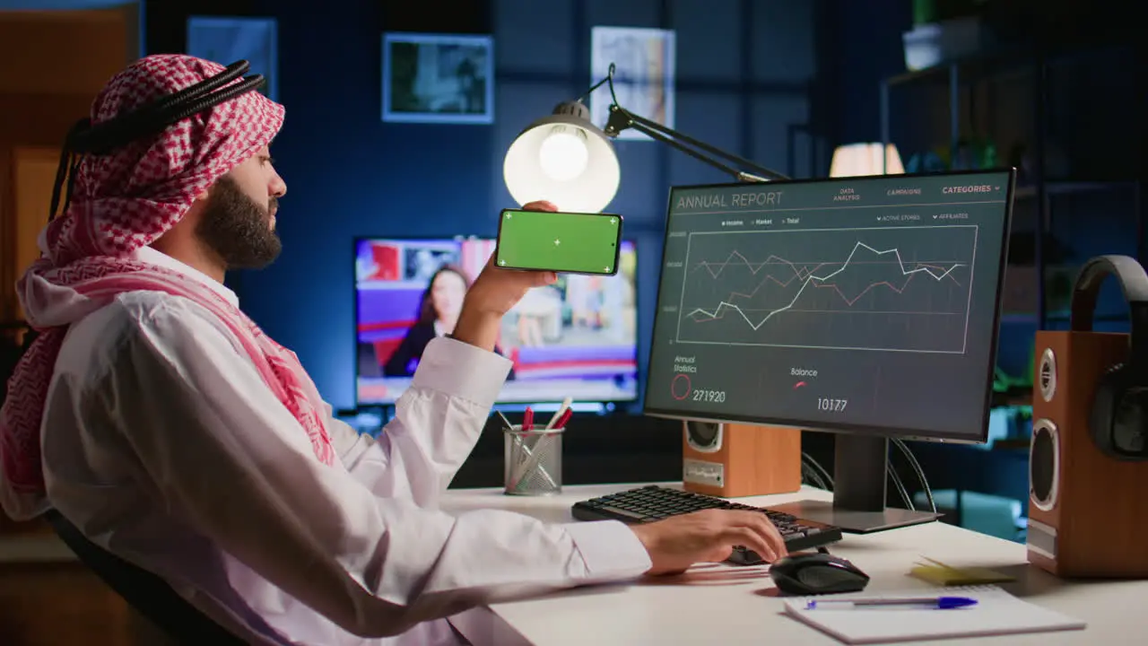 Man watches video on mockup phone at job