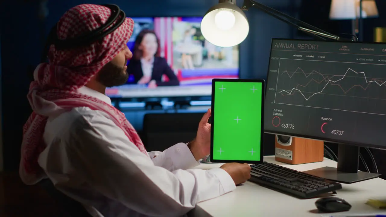 Remote worker holds chroma key tablet