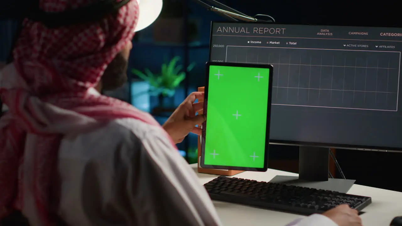 Worker holds isolated screen tablet