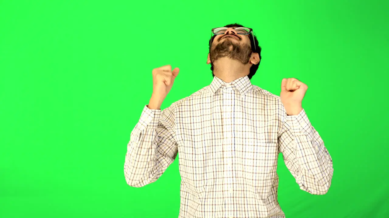 indian business guy standing with green background