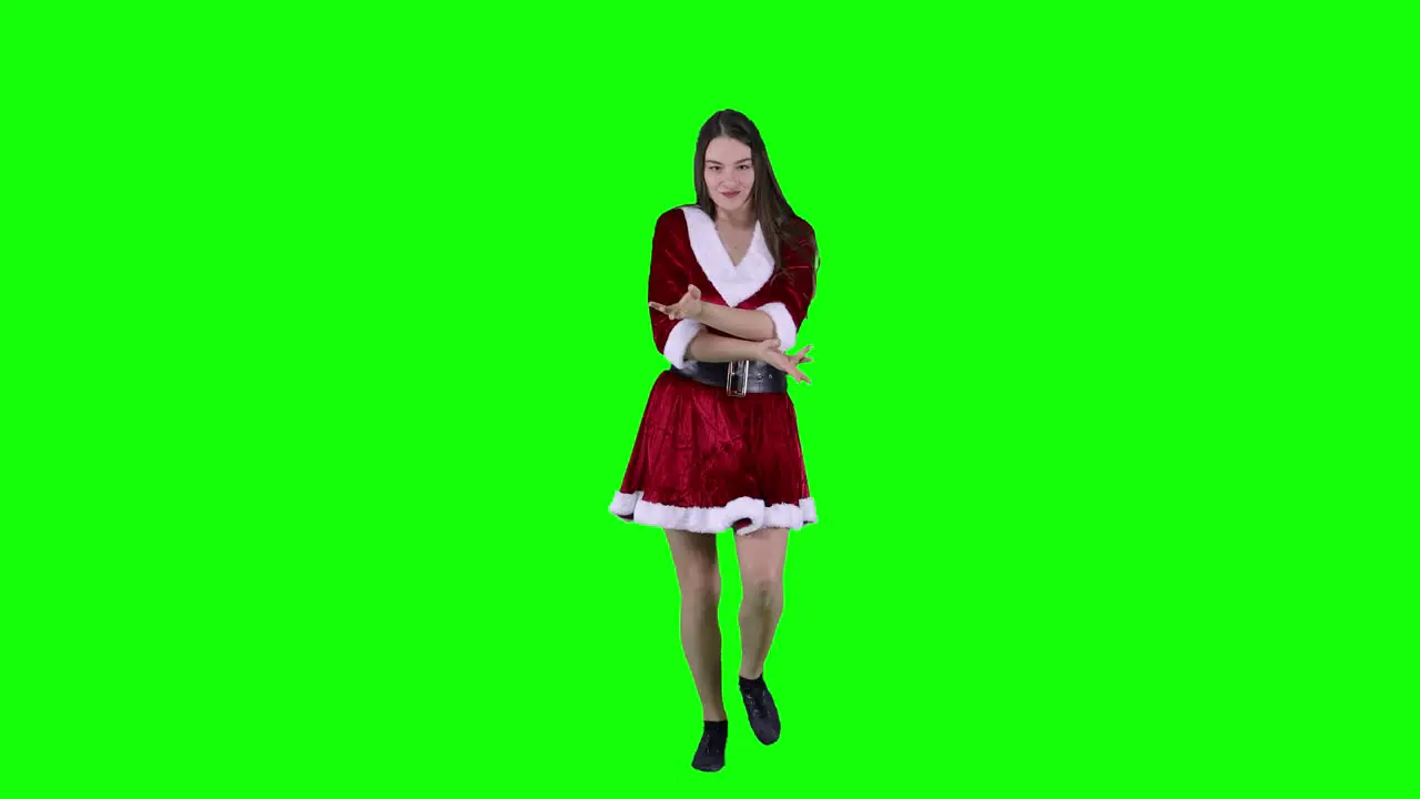 Carefree vivacious woman dancing in front of green screen xmas Christmas Eve Female celebrate New Year feel alive and happy party