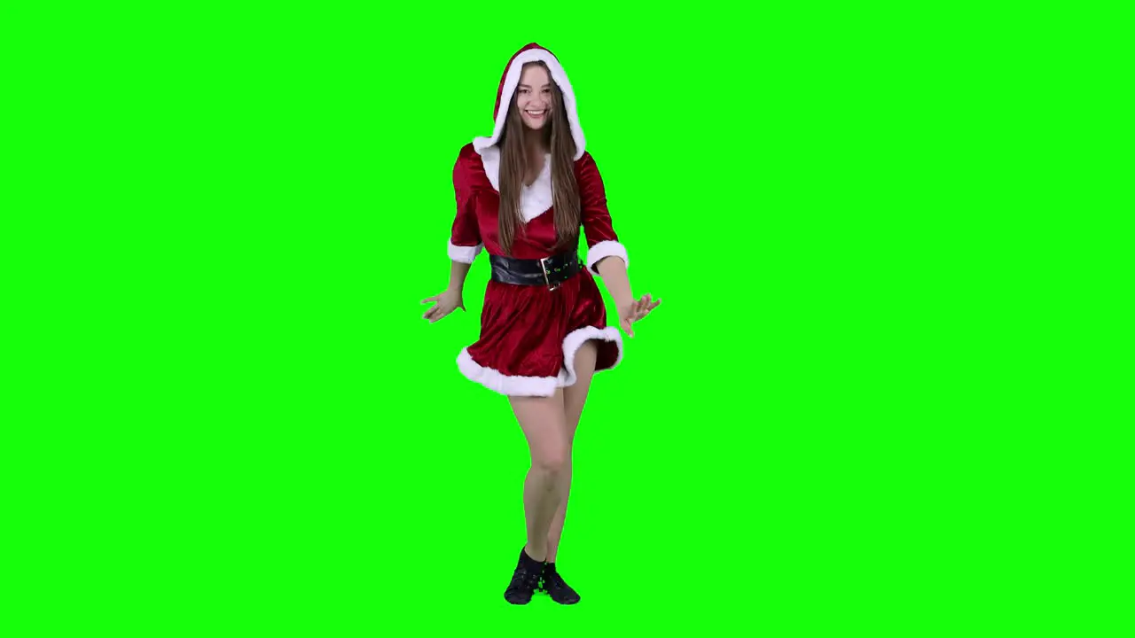 Woman dressed Santa costume dancing sexy young Caucasian woman seductive dance Christmas holiday party concept