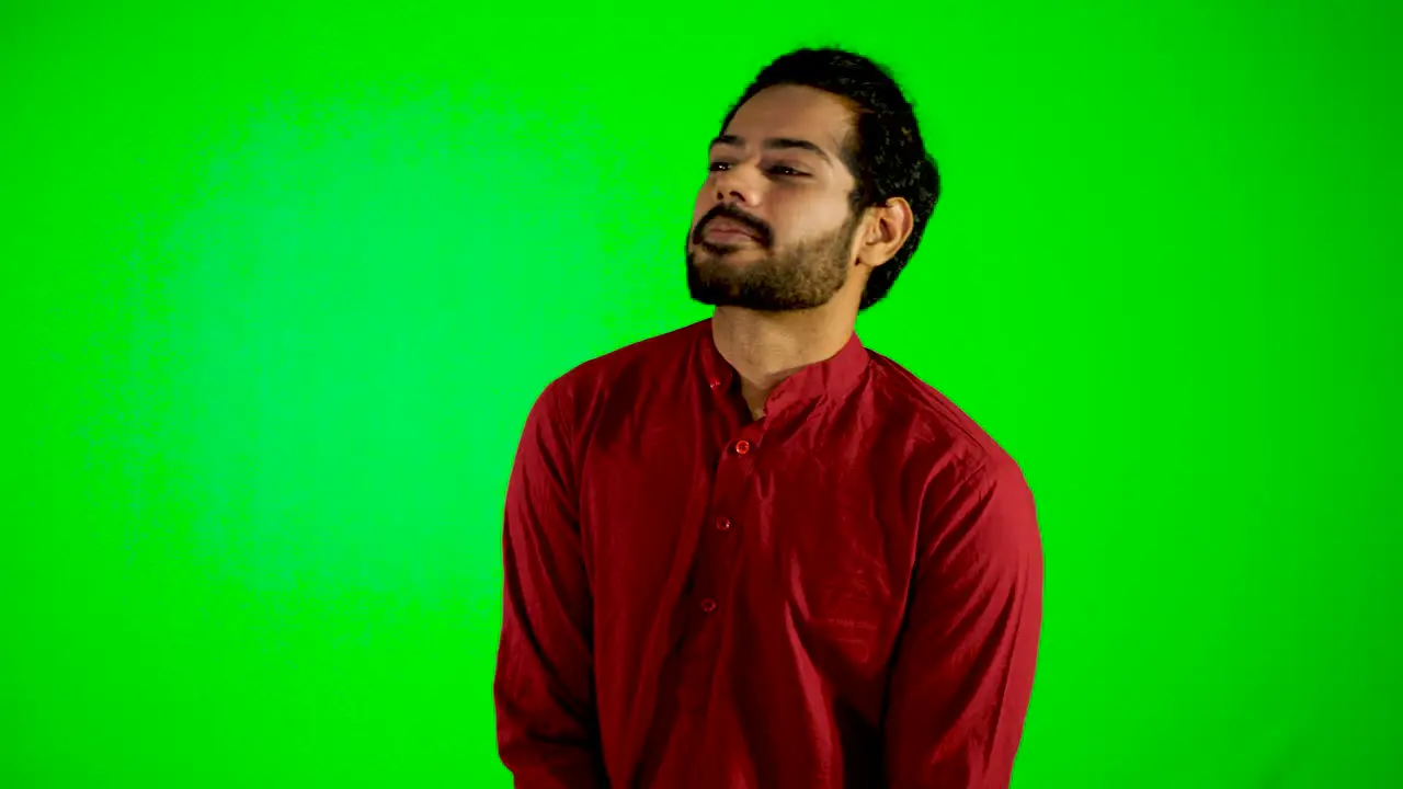 Indian guy say hello to girl with green screen