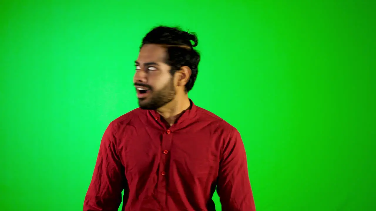 Indian guy surprising motion with green screen green background