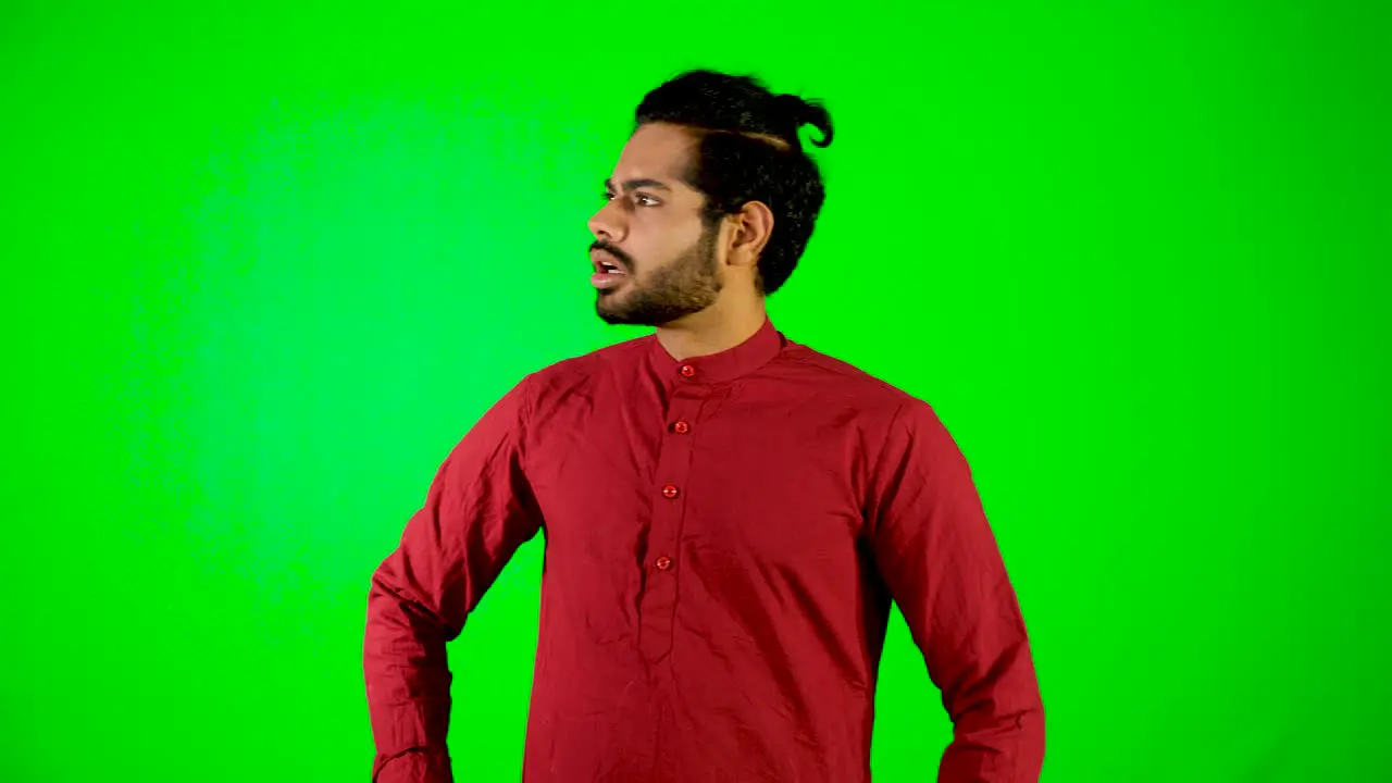 Indian guy lost the way with green background green screen chromakey