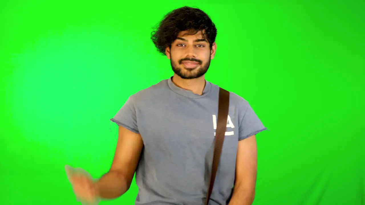 indian tourist is walking on road with green background green screen