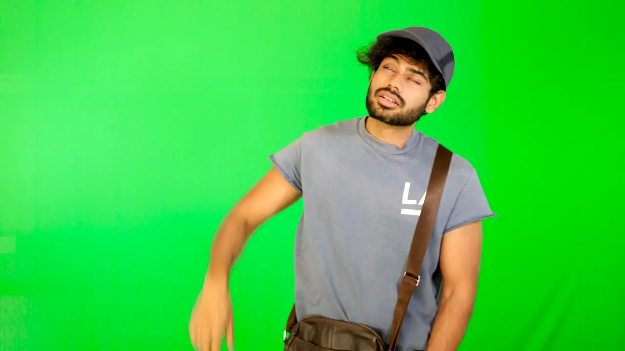 Indian guy feel exhausted with green screen green table