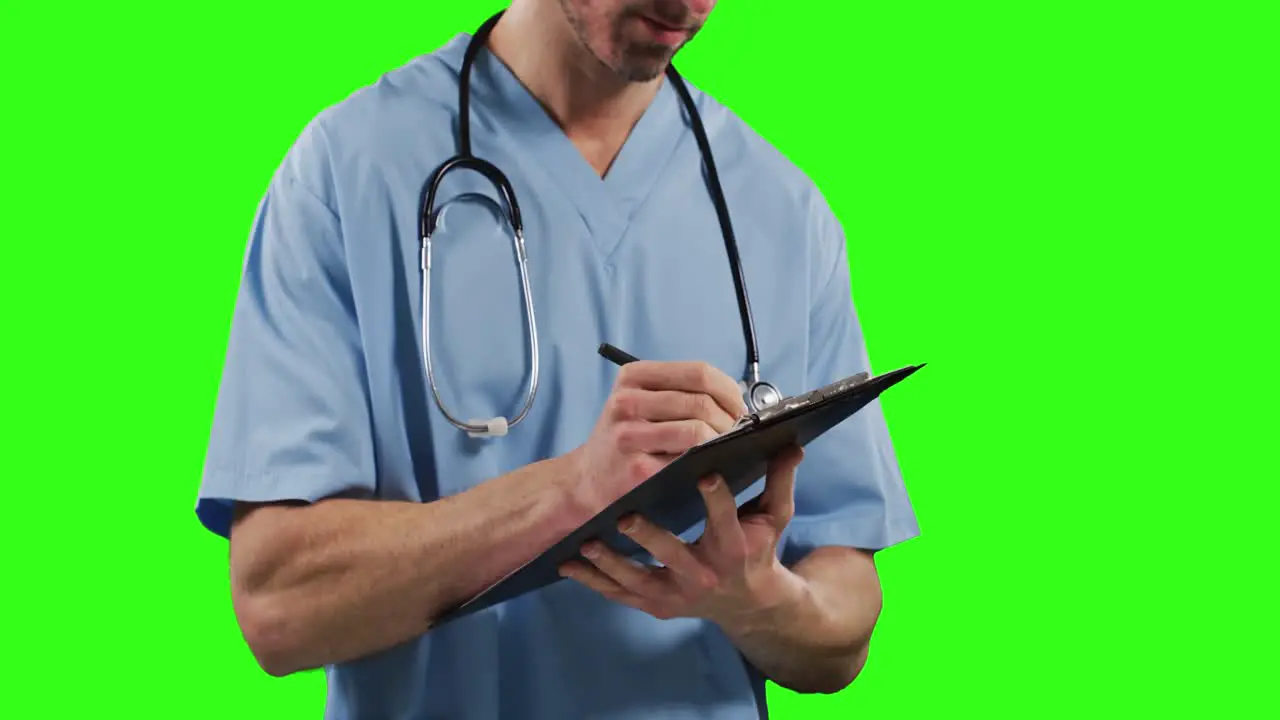 Caucasian male doctor on green screen background