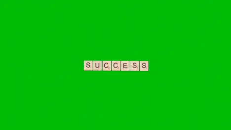 Stop Motion Business Concept Overhead Wooden Letter Tiles Forming Word Success On Green Screen