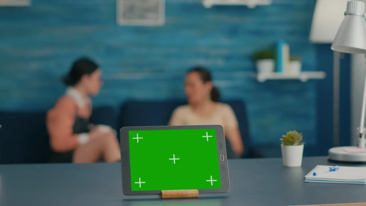 Isolated digital tablet with mock up green screen chroma key display