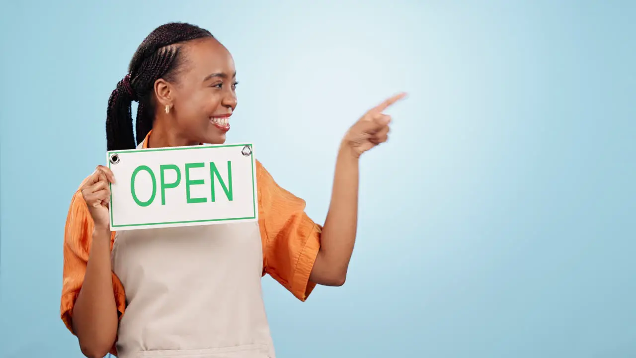 Excited black woman and sign for mockup pointing