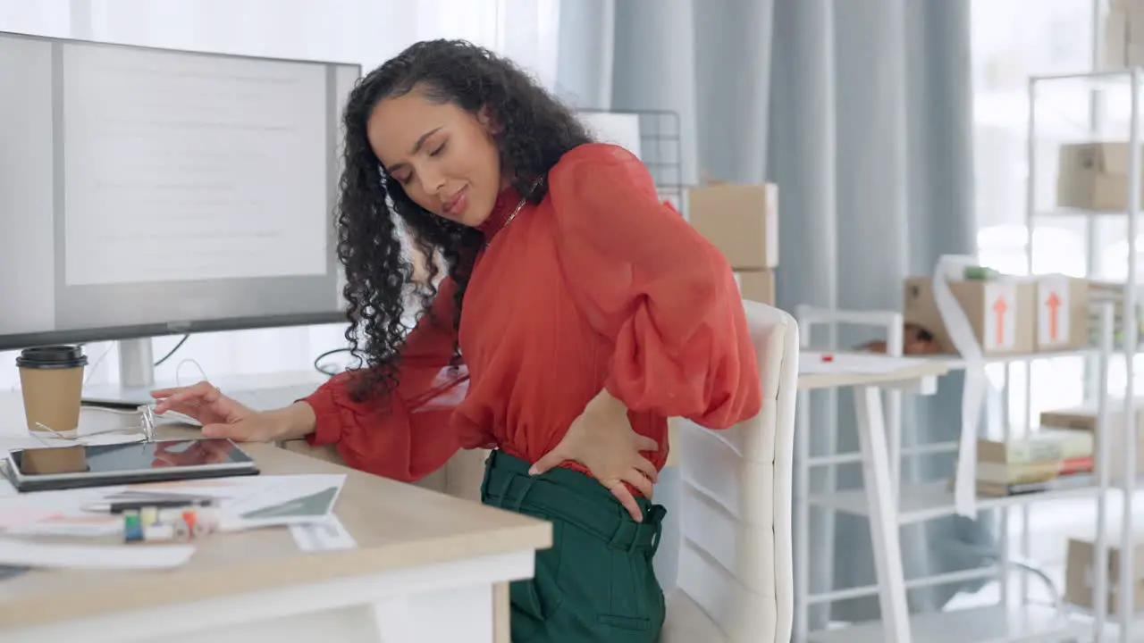 Stress woman with back pain and ecommerce office