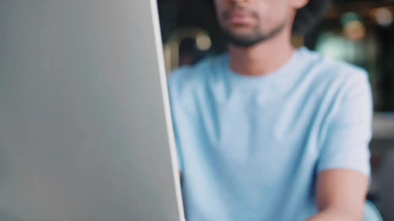 African man working with computer in the office